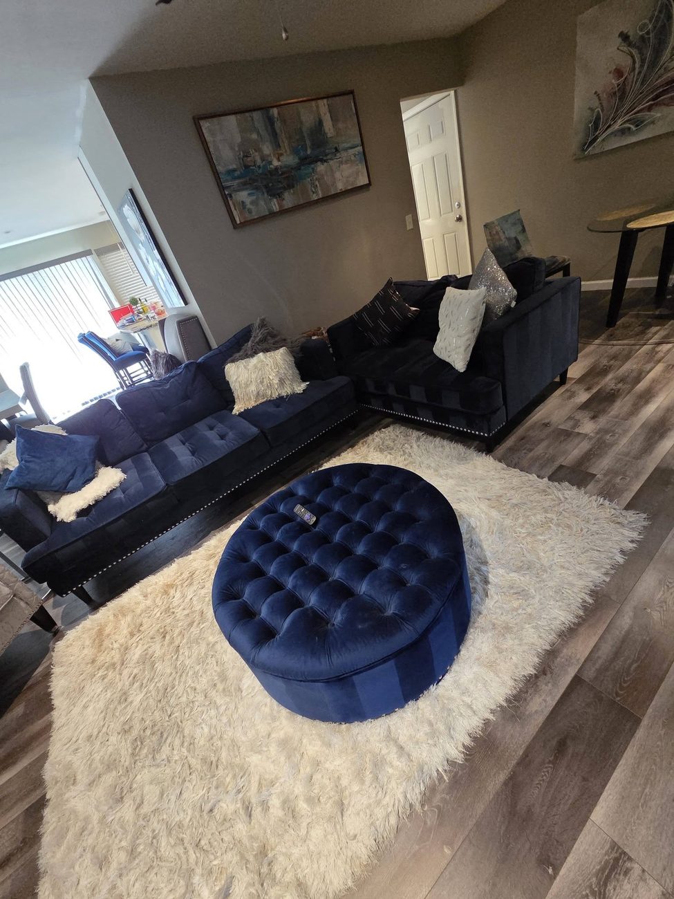 A living room vacuumed and reset after a Home Harmony clean